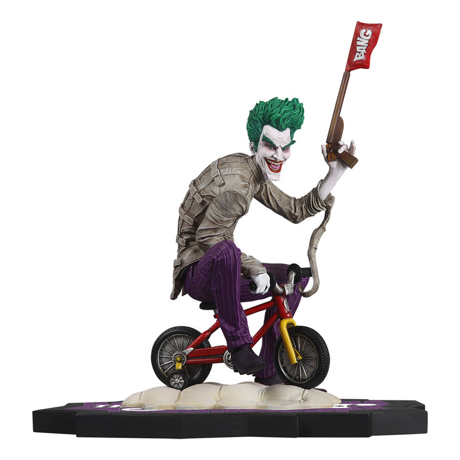 la folie violette du joker statue en résine à léchelle 110 du joker par kaare andrews
