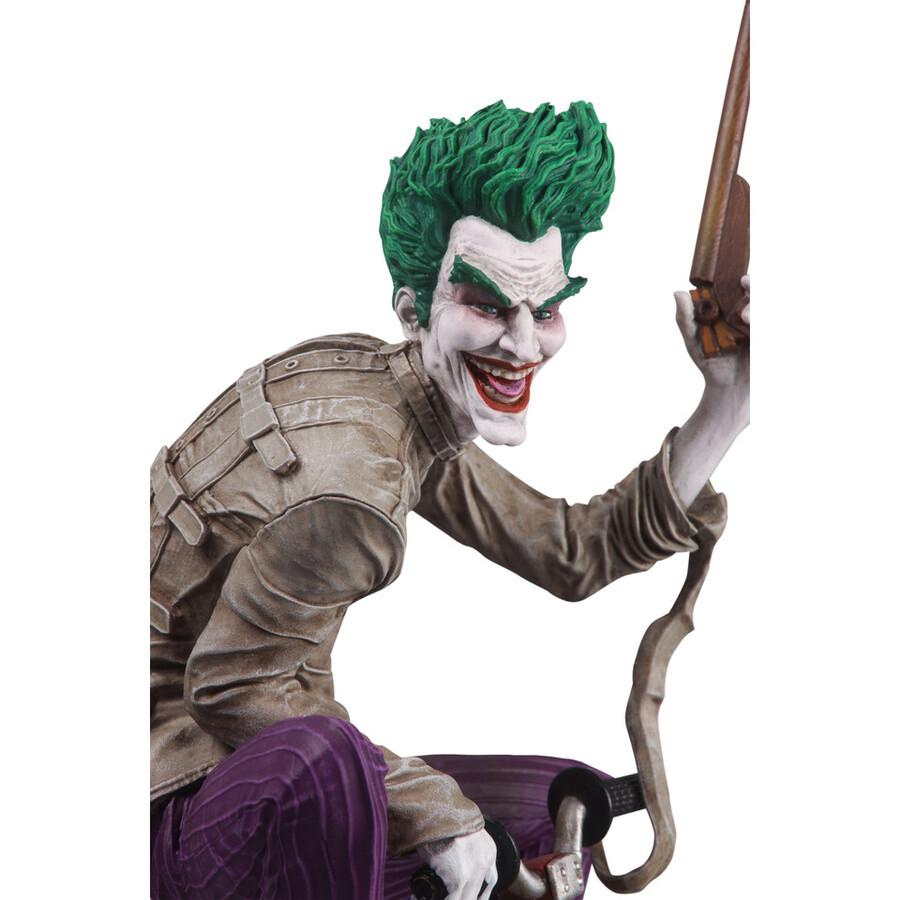 la folie violette du joker statue en résine à léchelle 110 du joker par kaare andrews